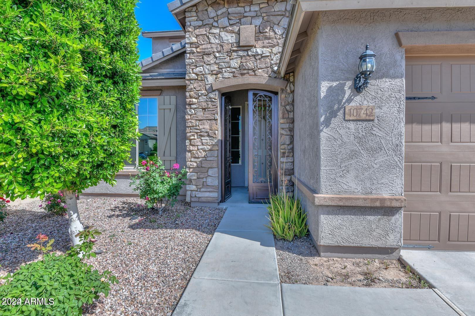 10742 W PRICKLY PEAR Trail