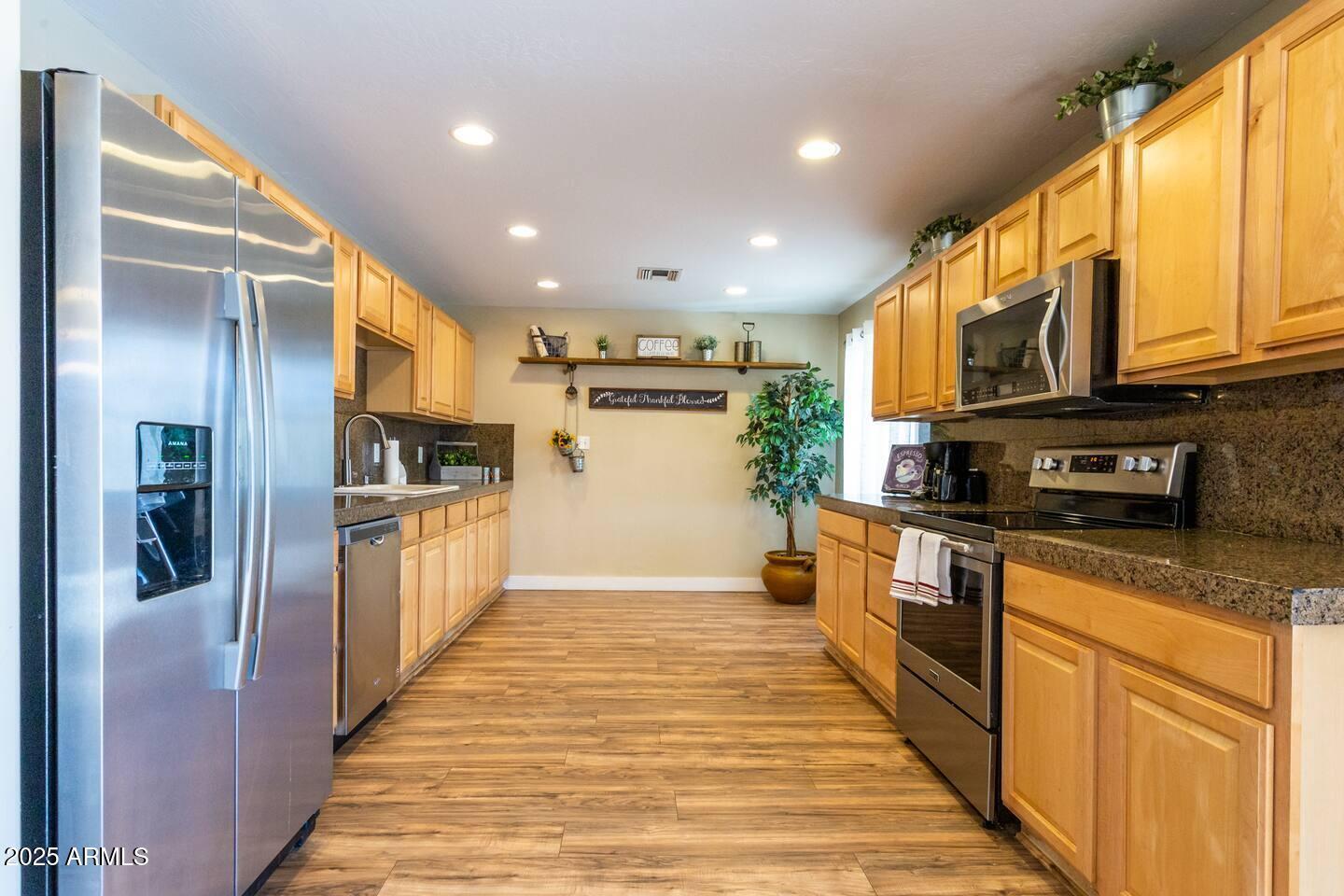 8447 E SHERIDAN Street