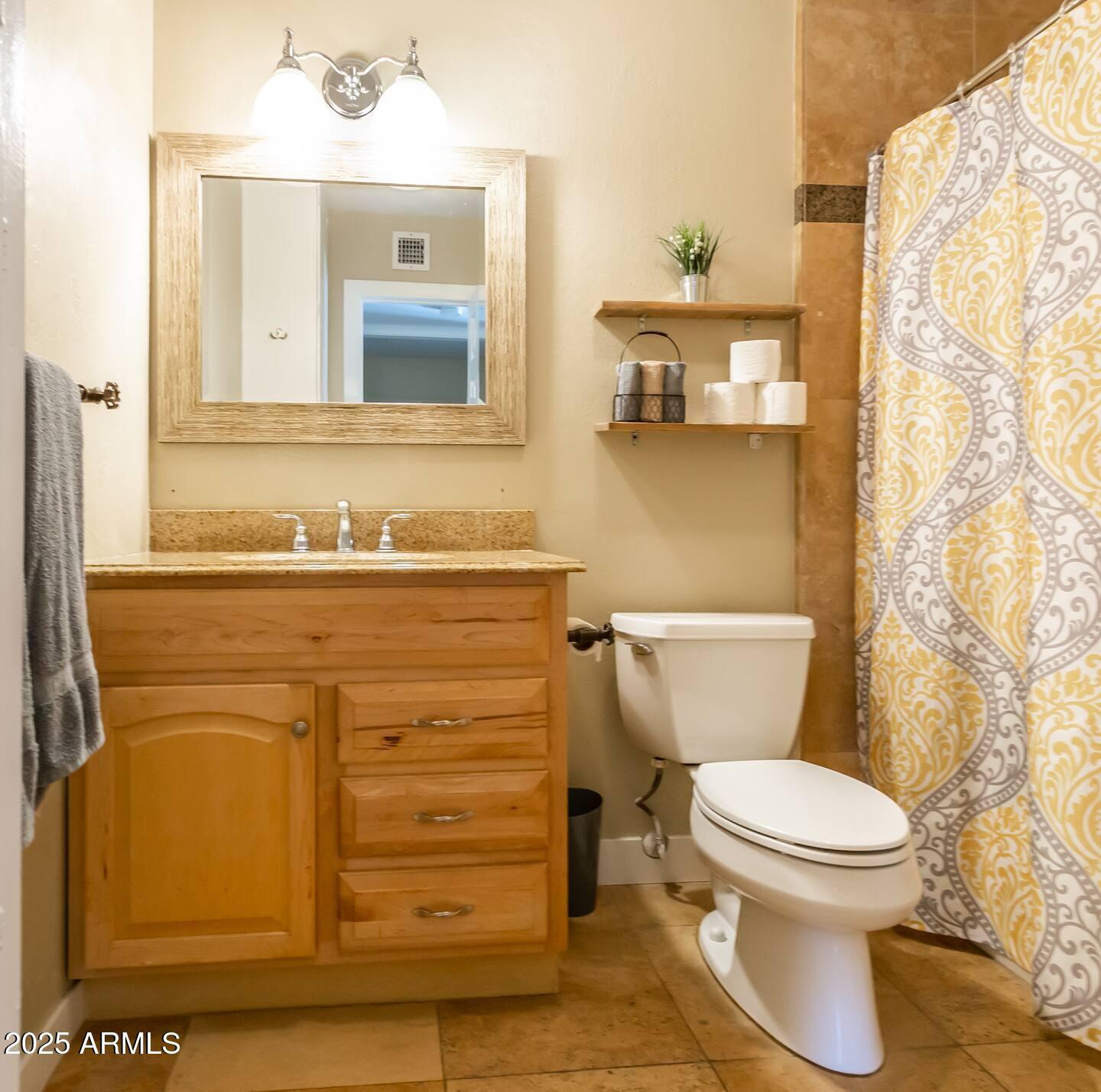 8447 E SHERIDAN Street