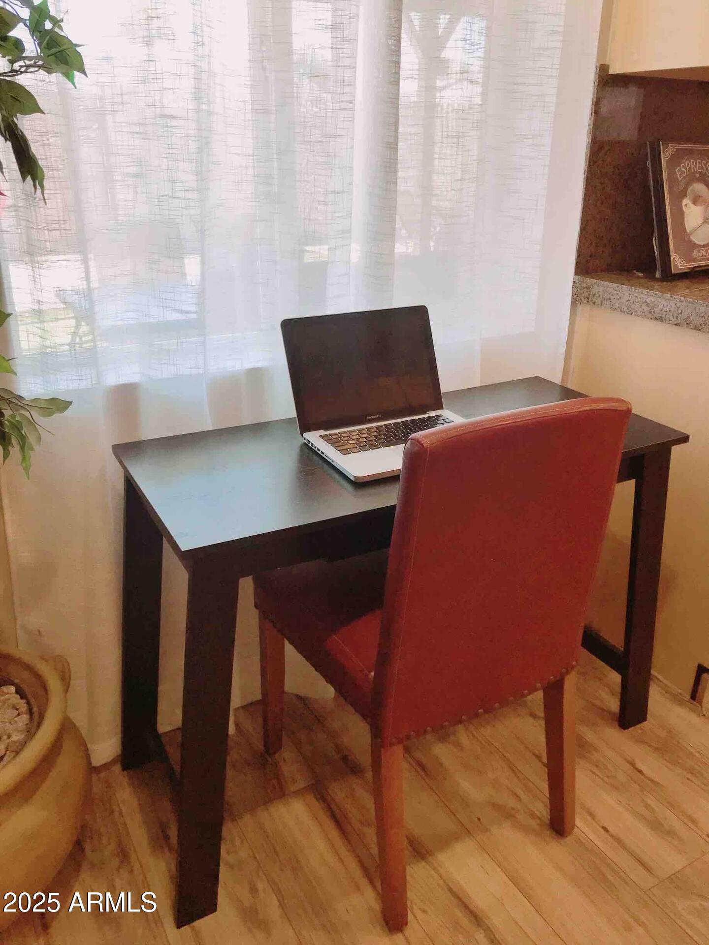 8447 E SHERIDAN Street