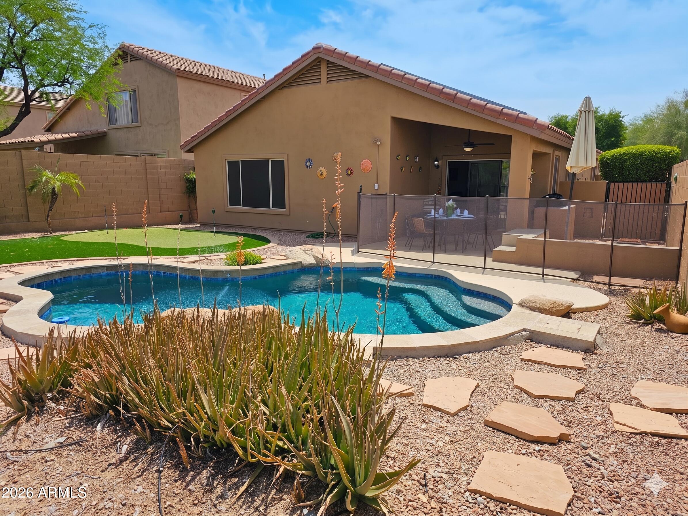 10456 E RAINTREE Drive