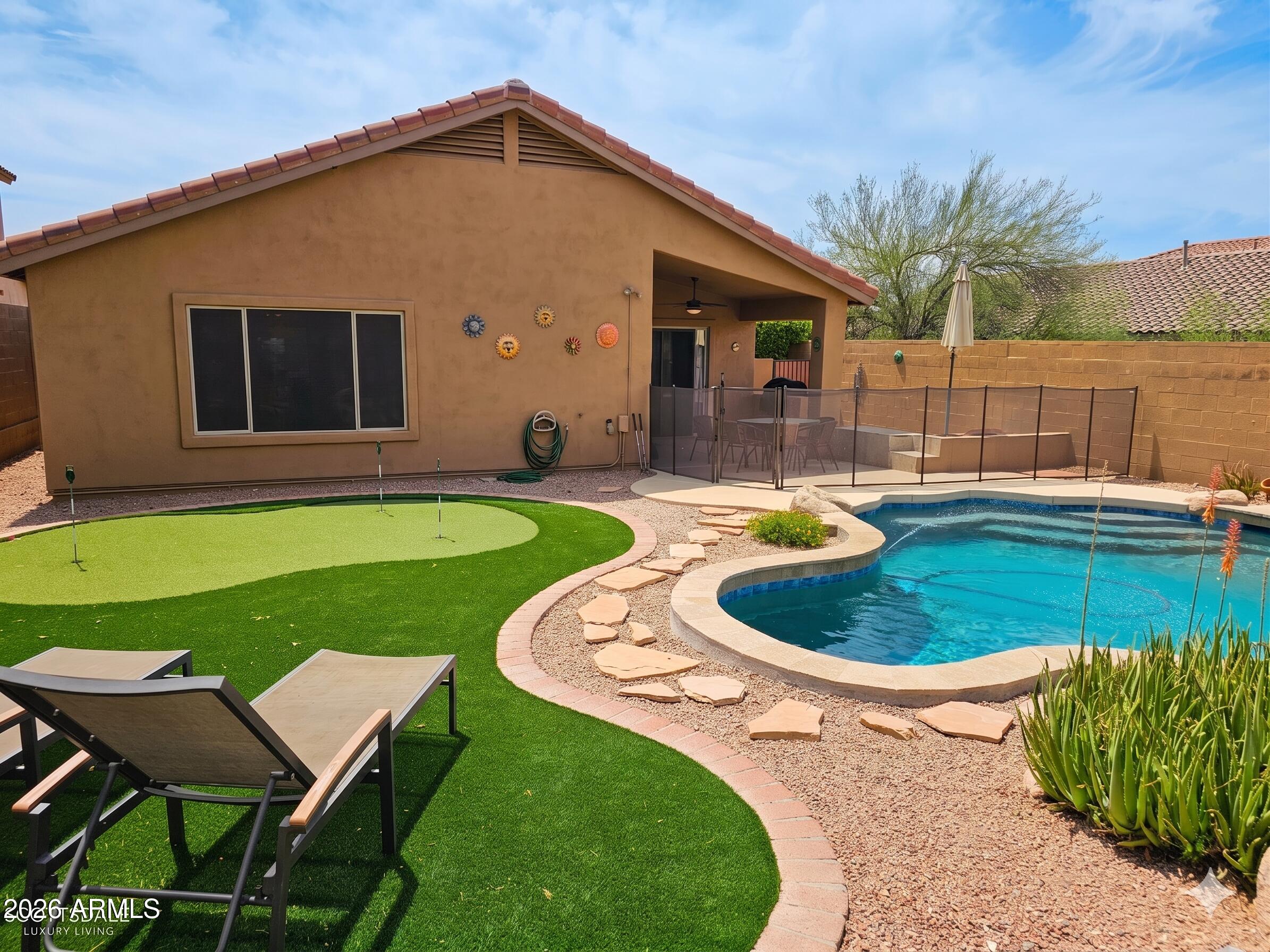 10456 E RAINTREE Drive