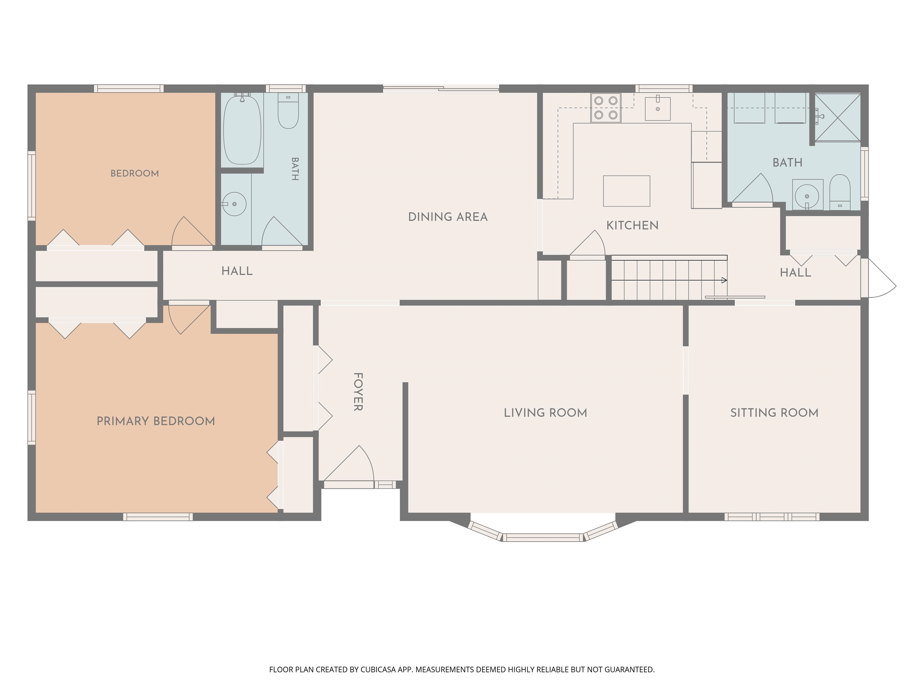 Floor plan showing two bedrooms, two bathrooms, a kitchen, dining area, living room, and sitting room.