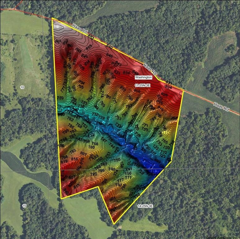 Aerial map of a Haas Road parcel outlined in yellow, with color-coded elevation contours.