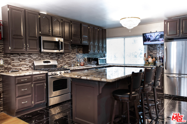 2410 BENEDICT CANYON DR