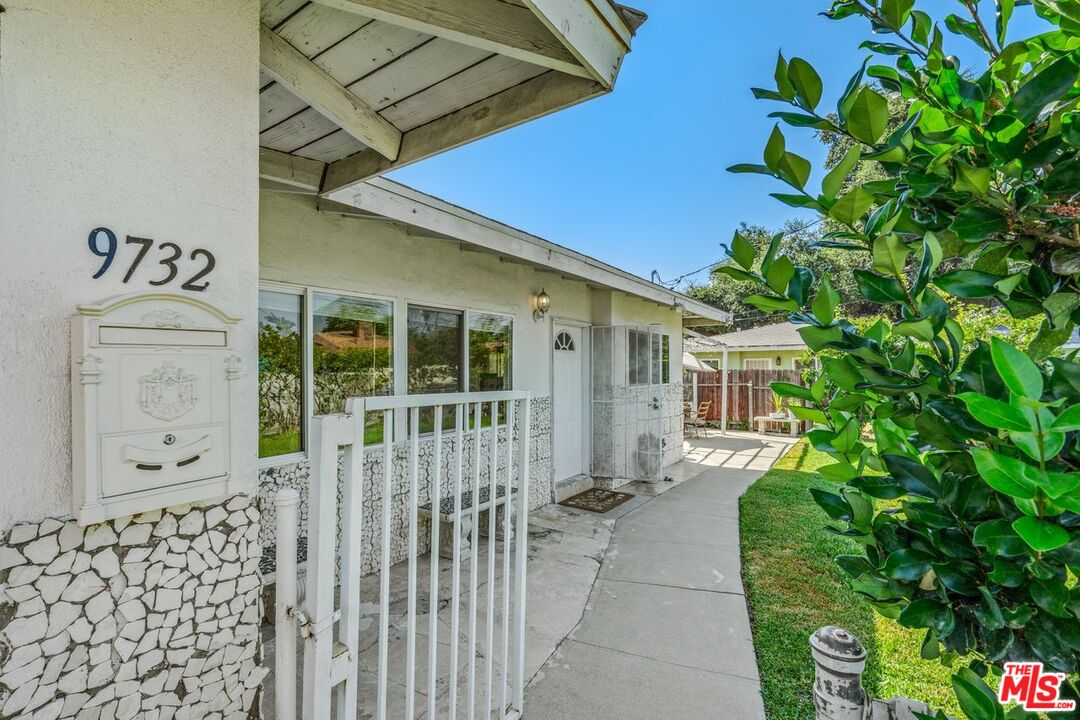 9732 E Camino Real Ave