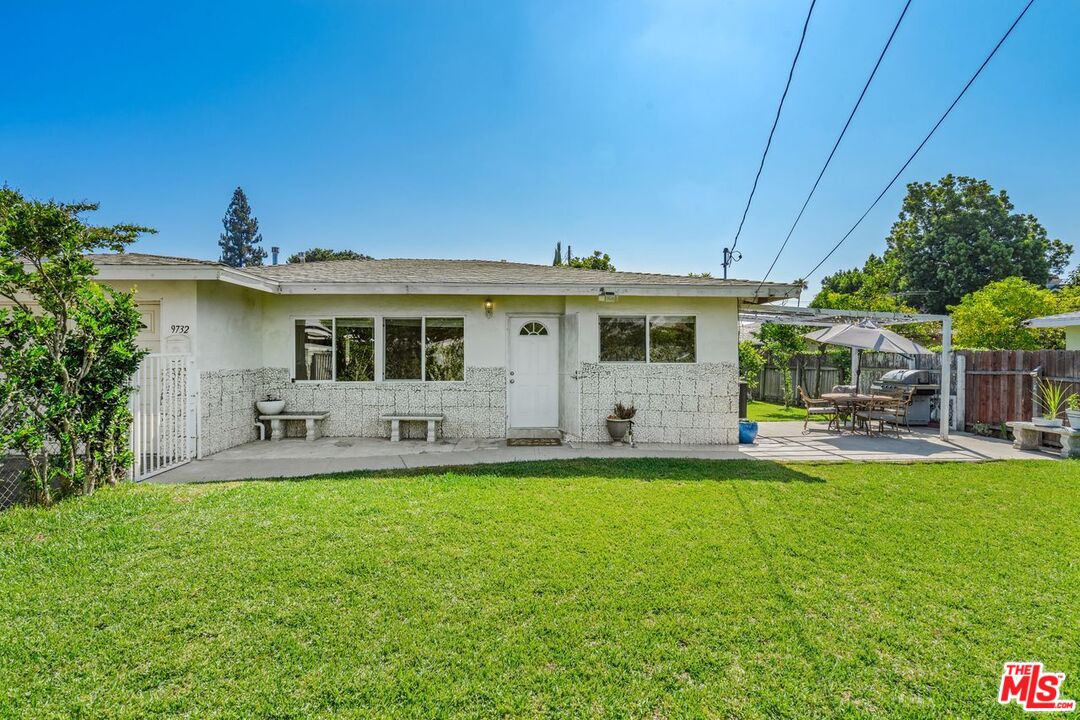 9732 E Camino Real Ave