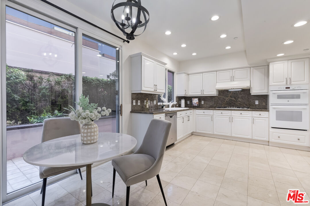 121 N Almont Dr Unit: 103