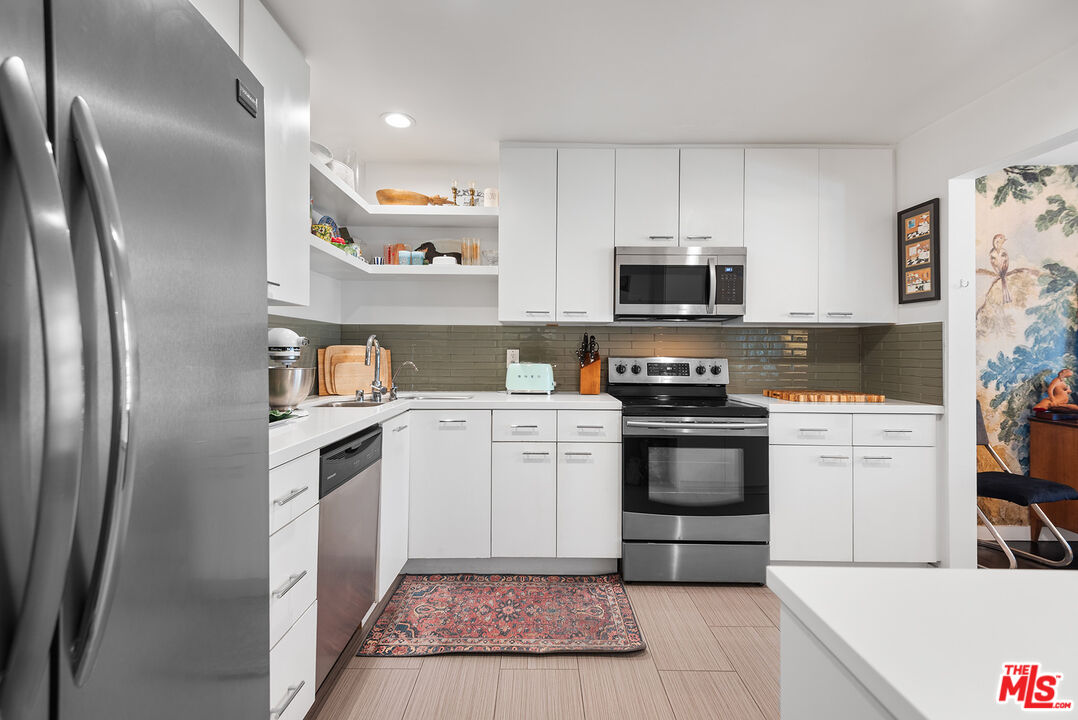 165 N Swall Dr Unit: 201