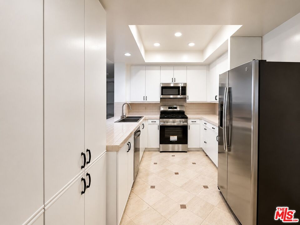 235 S TOWER DR Unit: 102