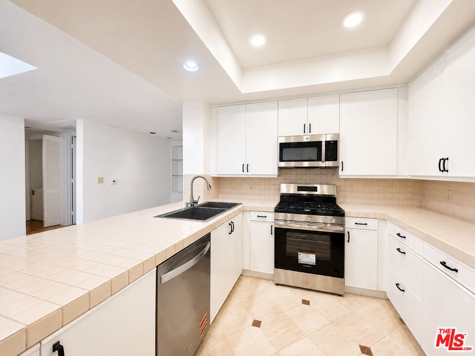 235 S TOWER DR Unit: 102