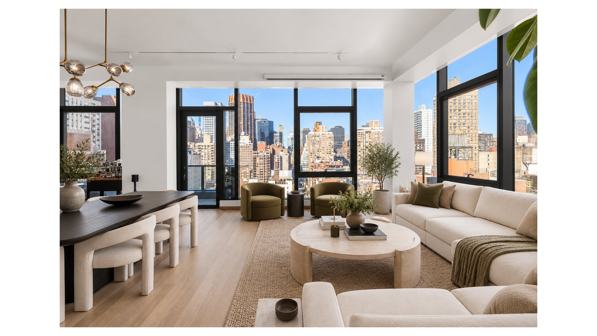 Open-plan living and dining room with floor-to-ceiling windows overlooking the city skyline.