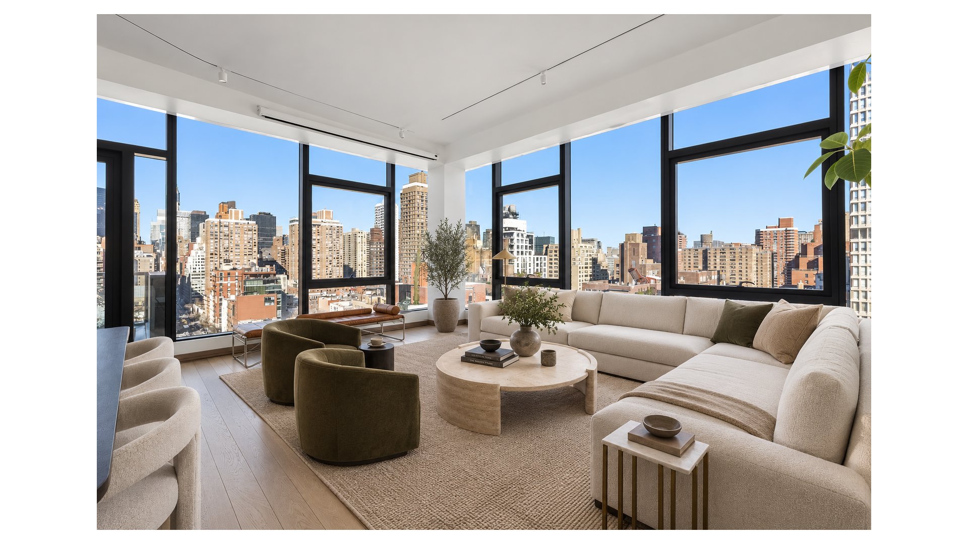 Bright living room with floor-to-ceiling windows overlooking the Manhattan skyline.
