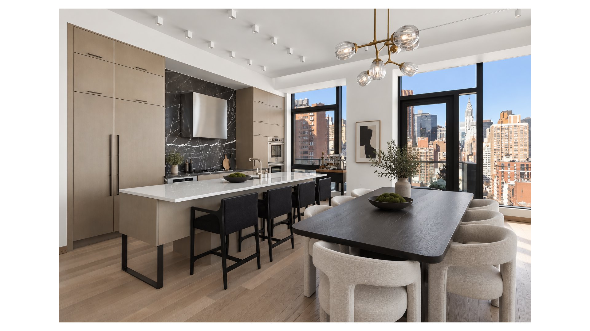 Modern kitchen and dining area with marble backsplash, island, and city skyline views through floor-to-ceiling windows.