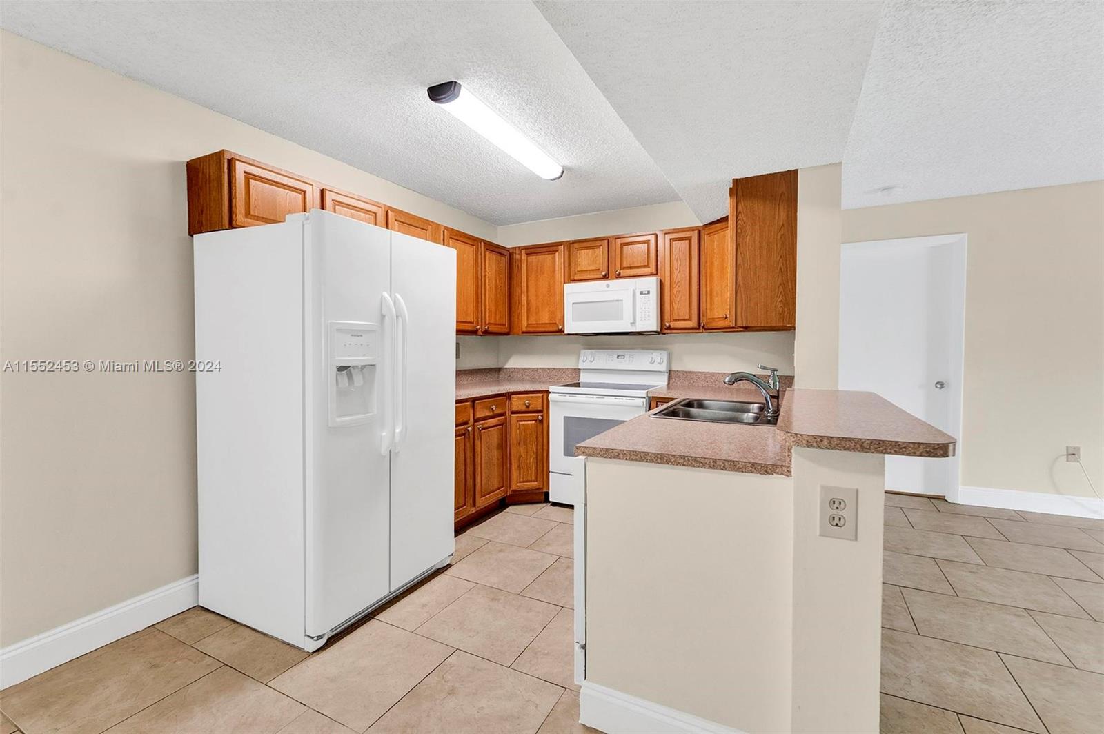 301 Palm Way # 203