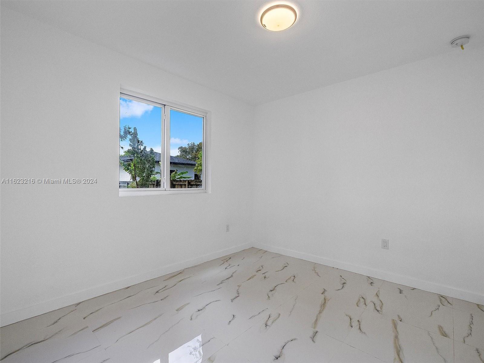 1884 NW 64th St