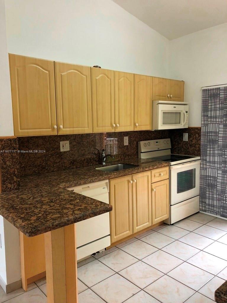 7500 W 20th Ave # 203