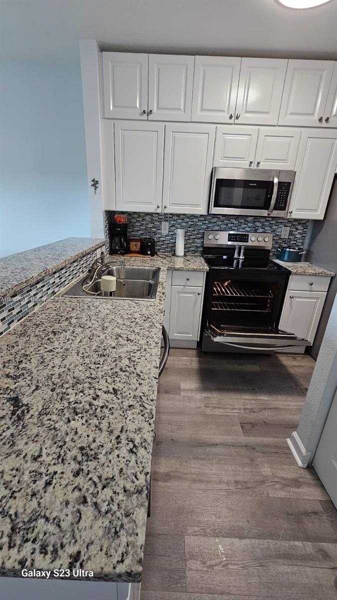 1690 NE 33rd Ave # 6 Unit: 104-6