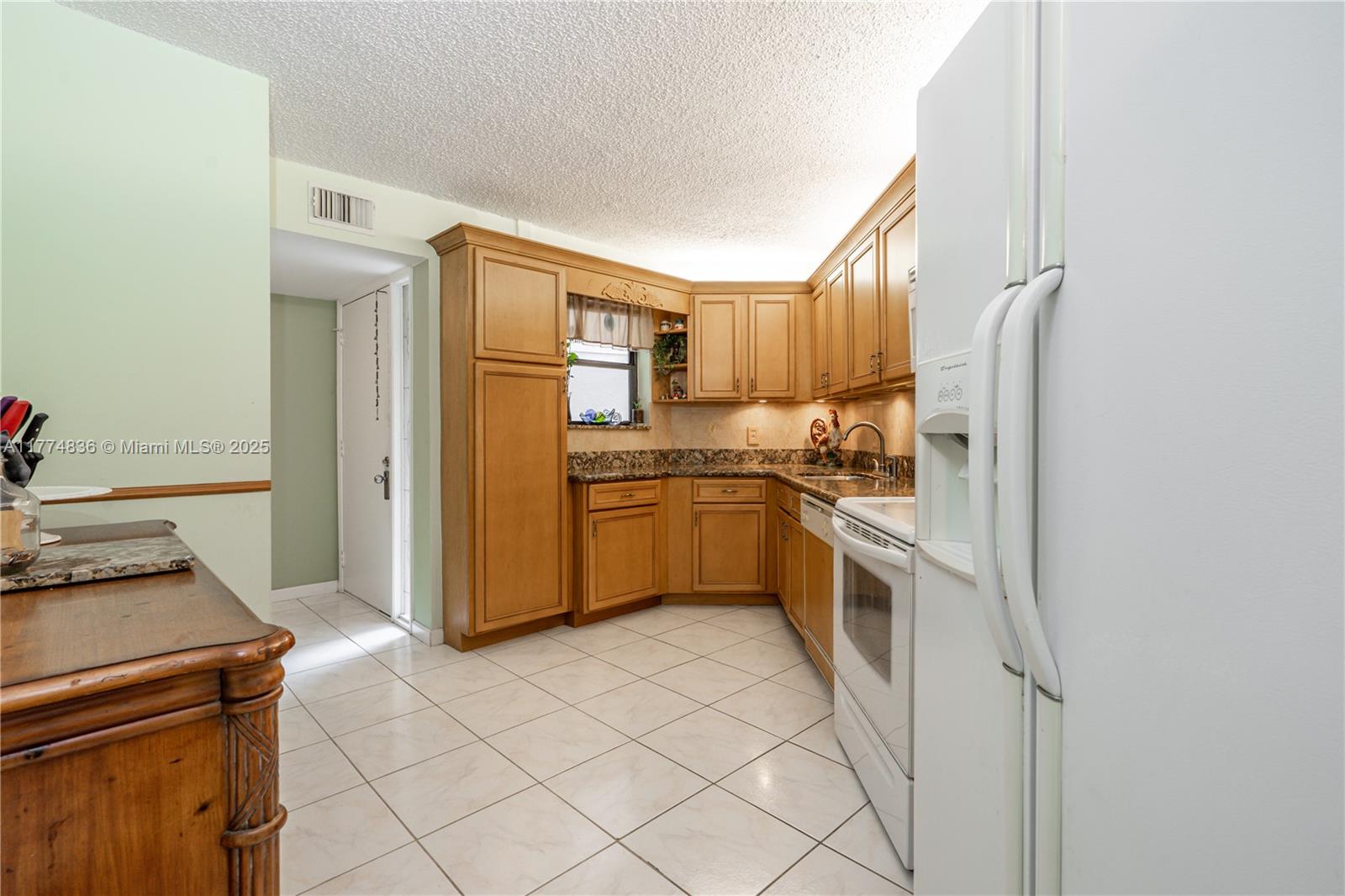 5750 Camino Del Sol # 103