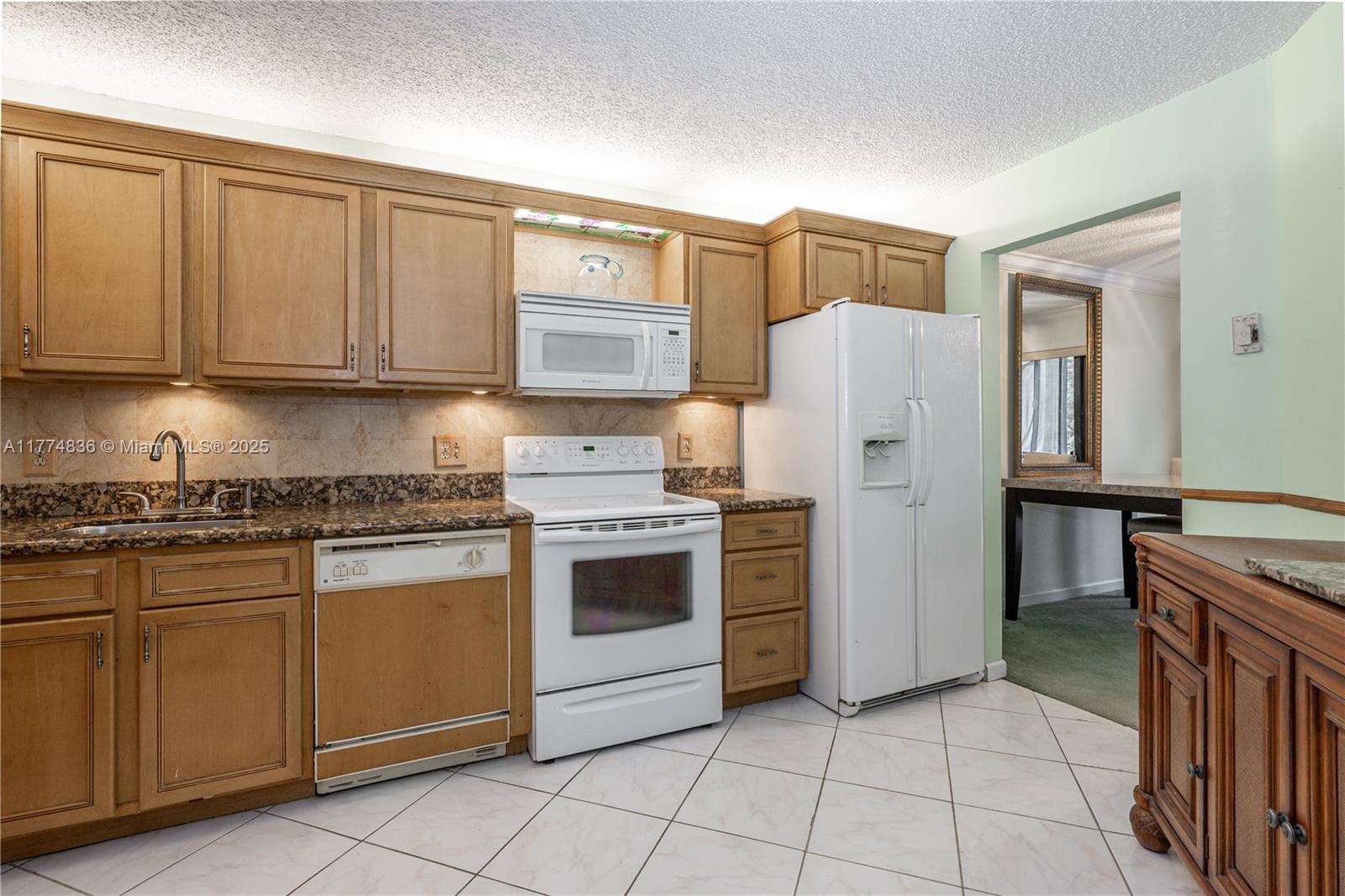 5750 Camino Del Sol # 103