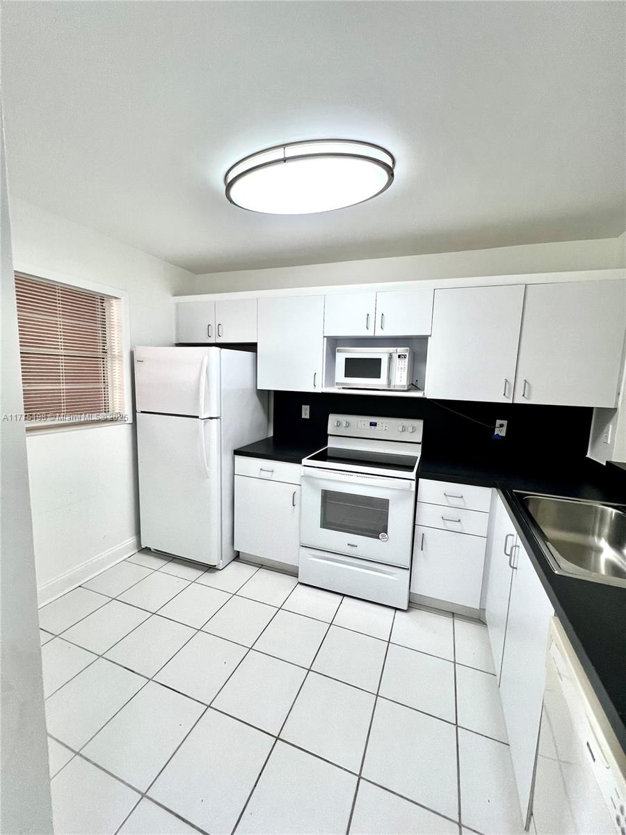 1920 Sabal Palm Dr # 404