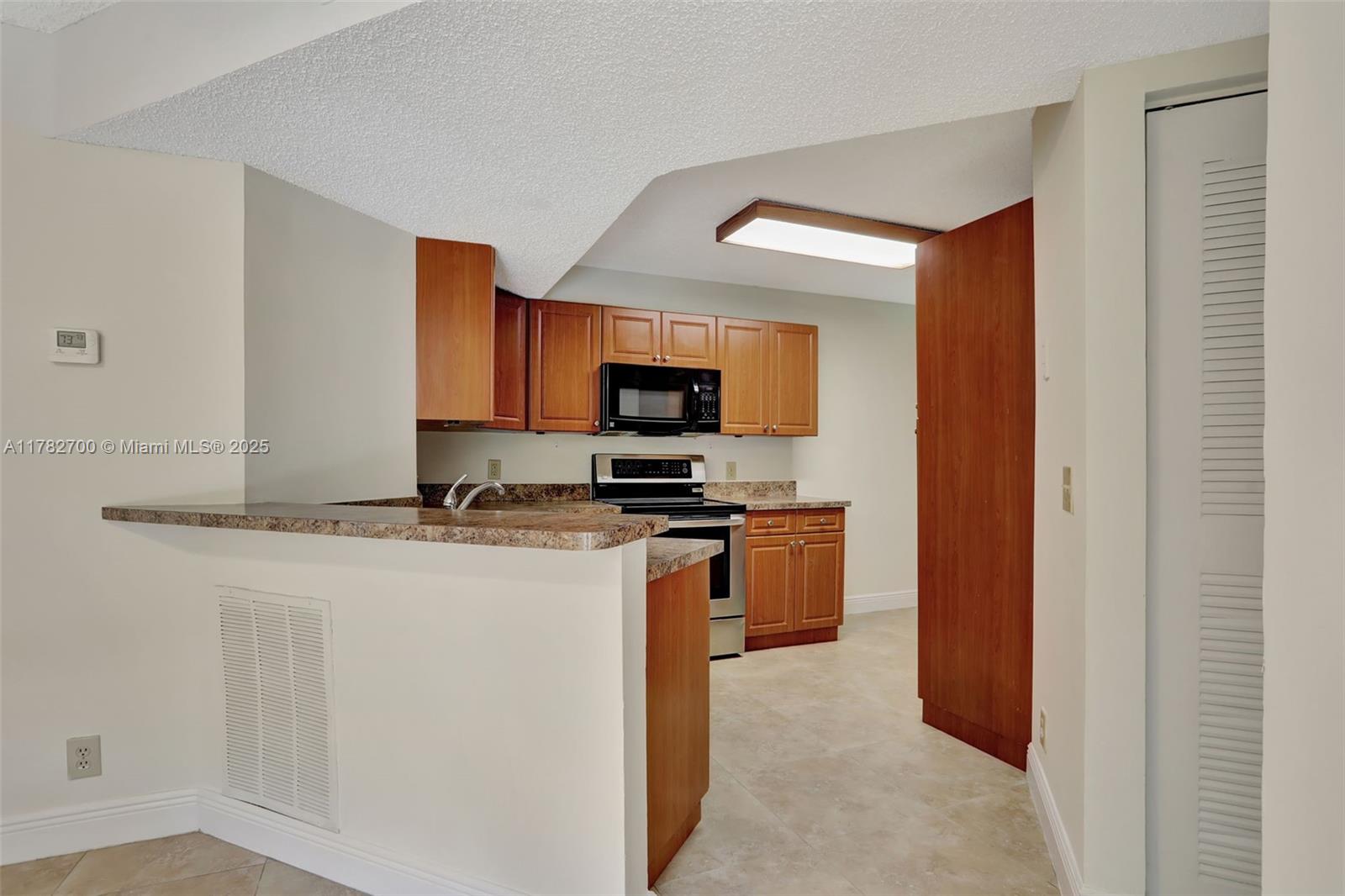 8891 Wiles Rd # 102