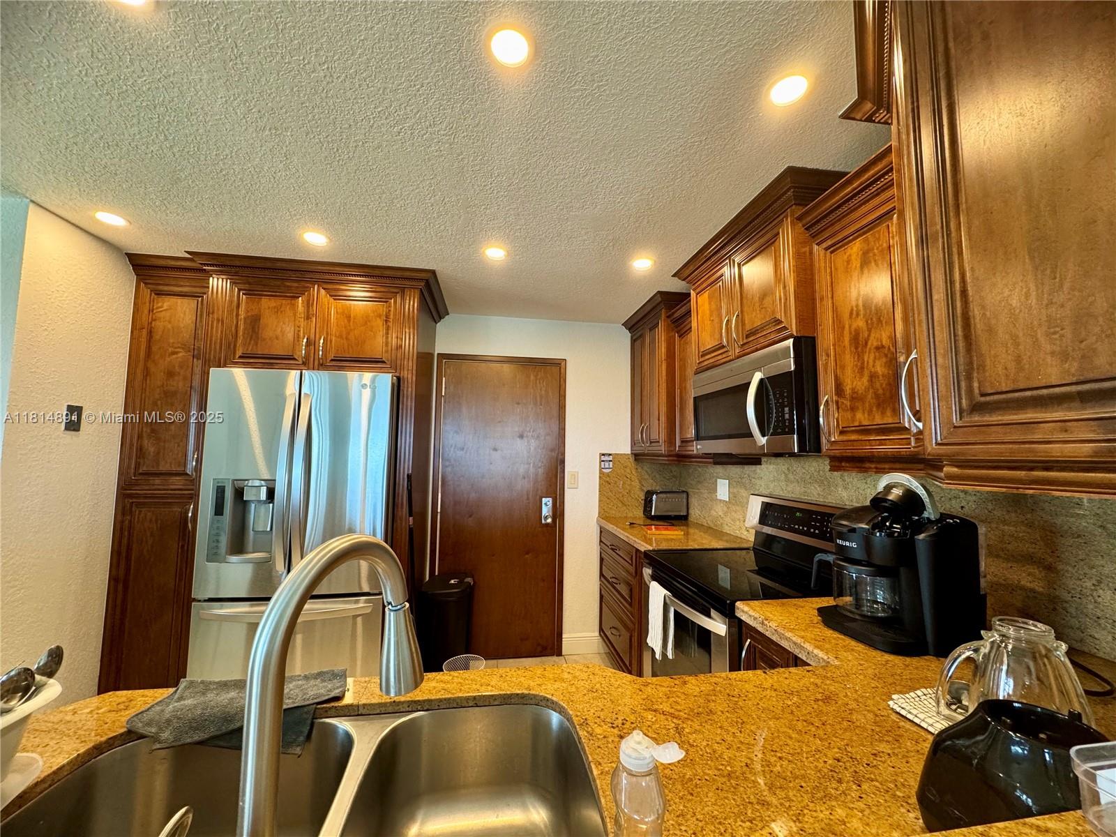 10777 W Sample Rd # 1006