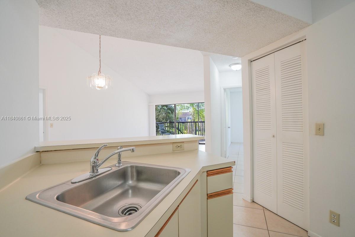 9033 Wiles Rd # 304