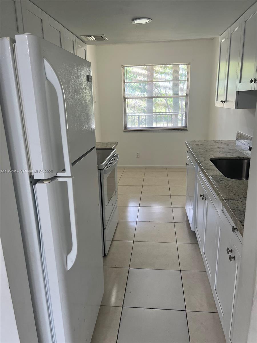 3301 NW 47th Ter # 203