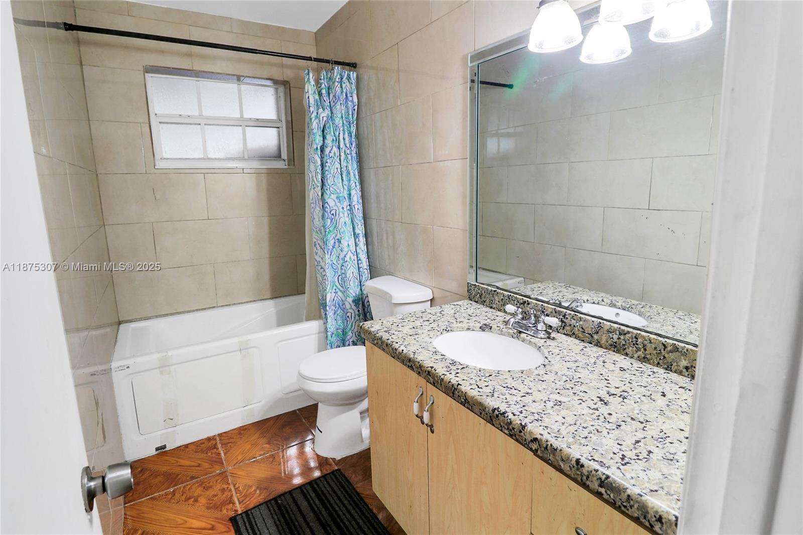 115 NE 213th St