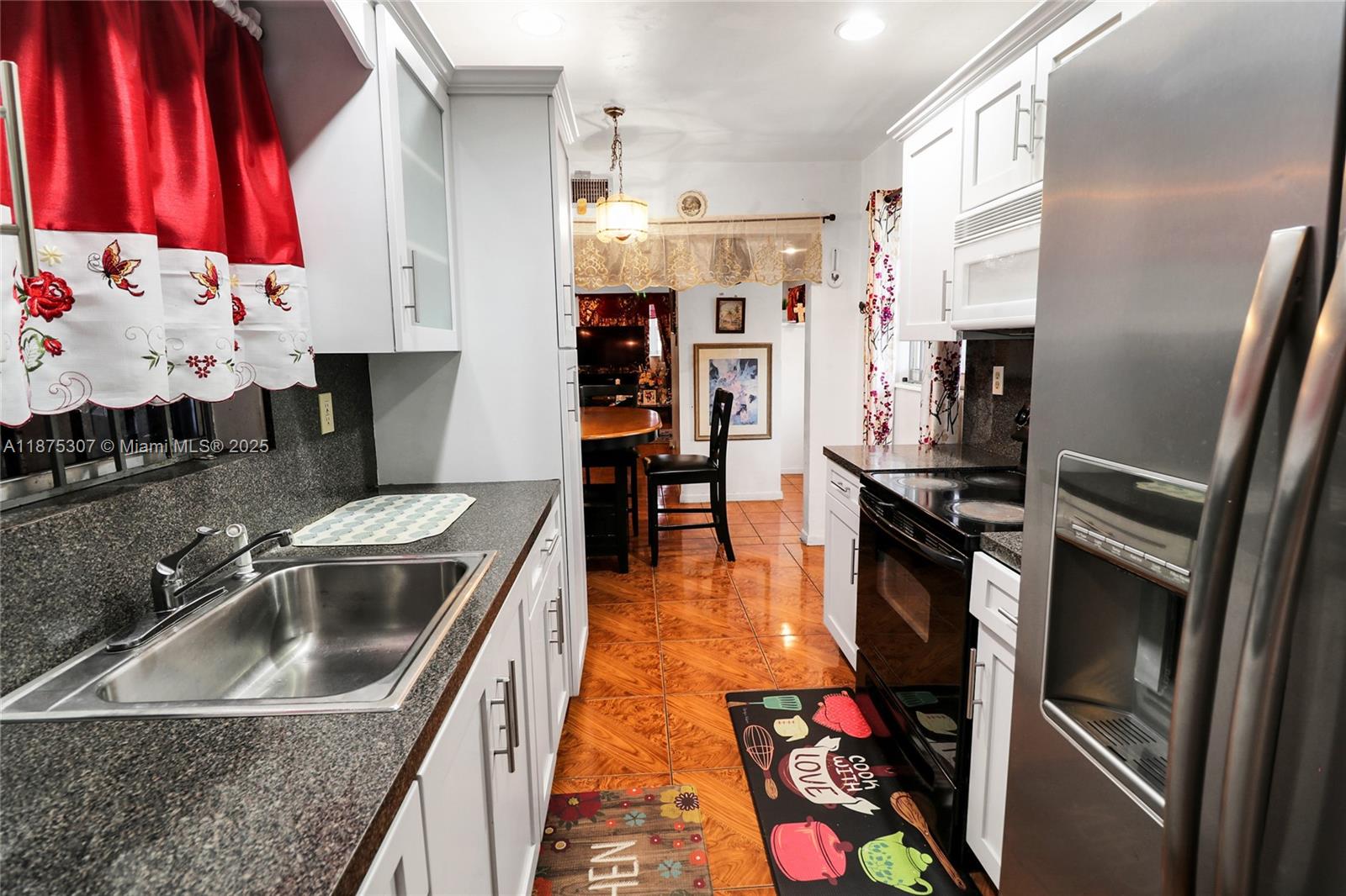 115 NE 213th St