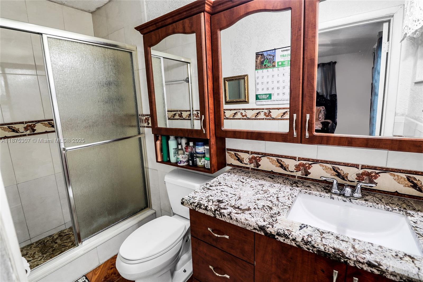 115 NE 213th St