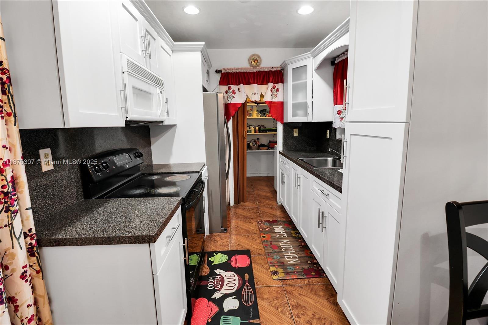 115 NE 213th St