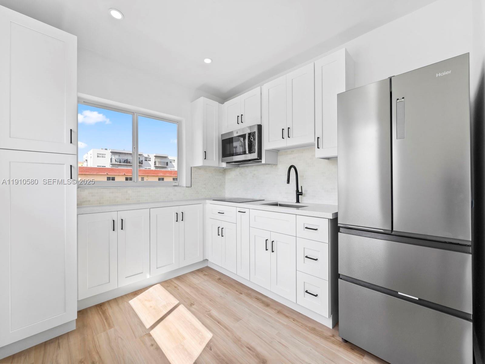 300 NW 7th Ave # 1