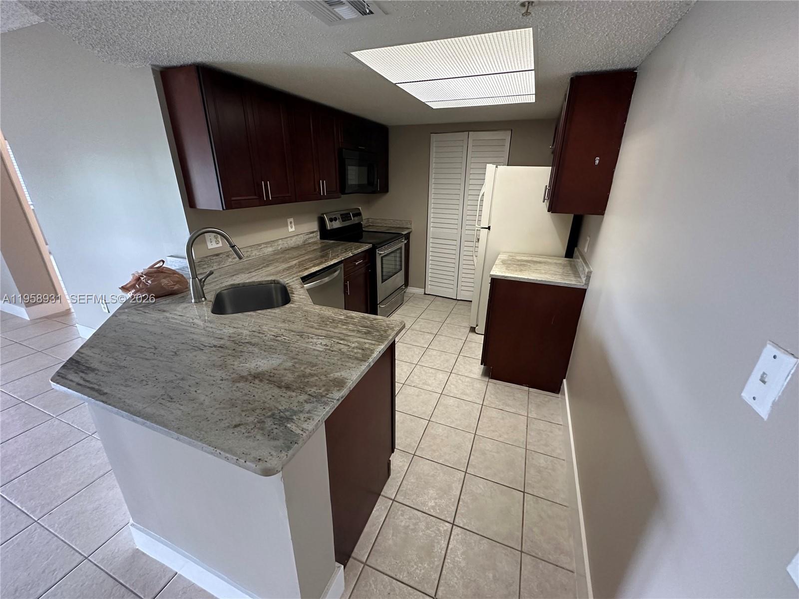 5005 Wiles Rd # 104