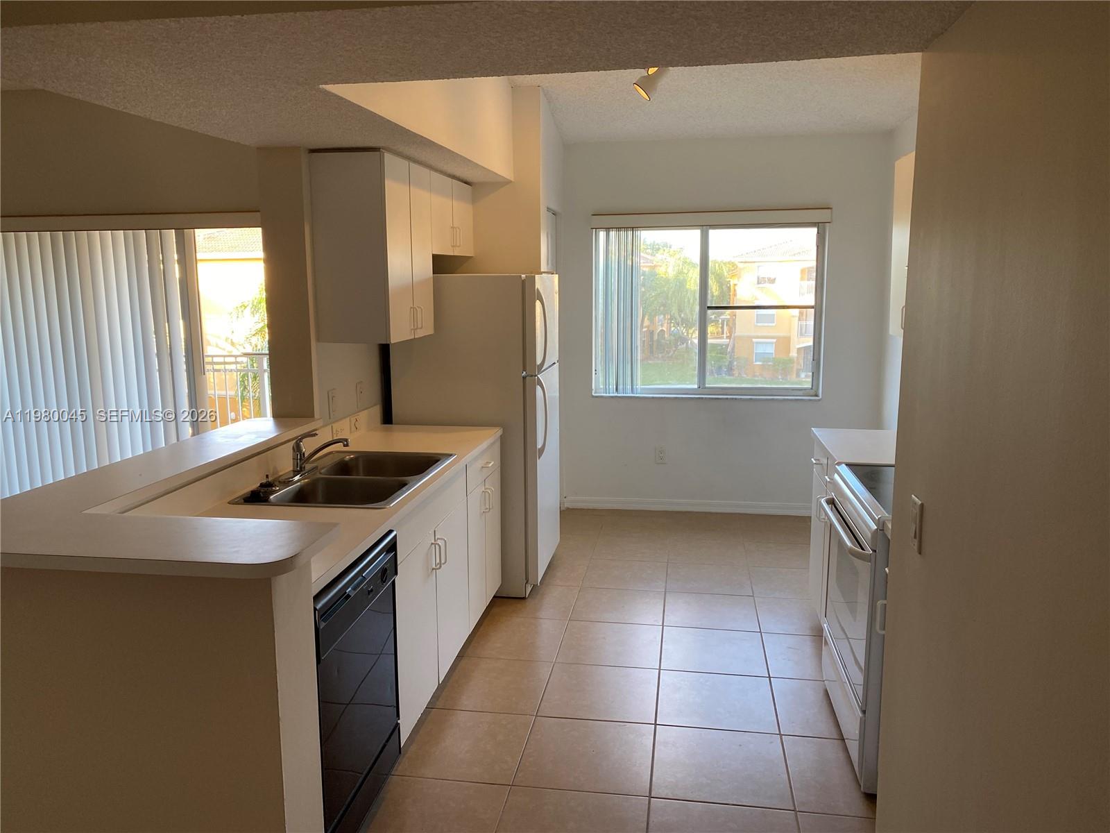 9645 NW 1ST CT # 302 Unit: 1-302