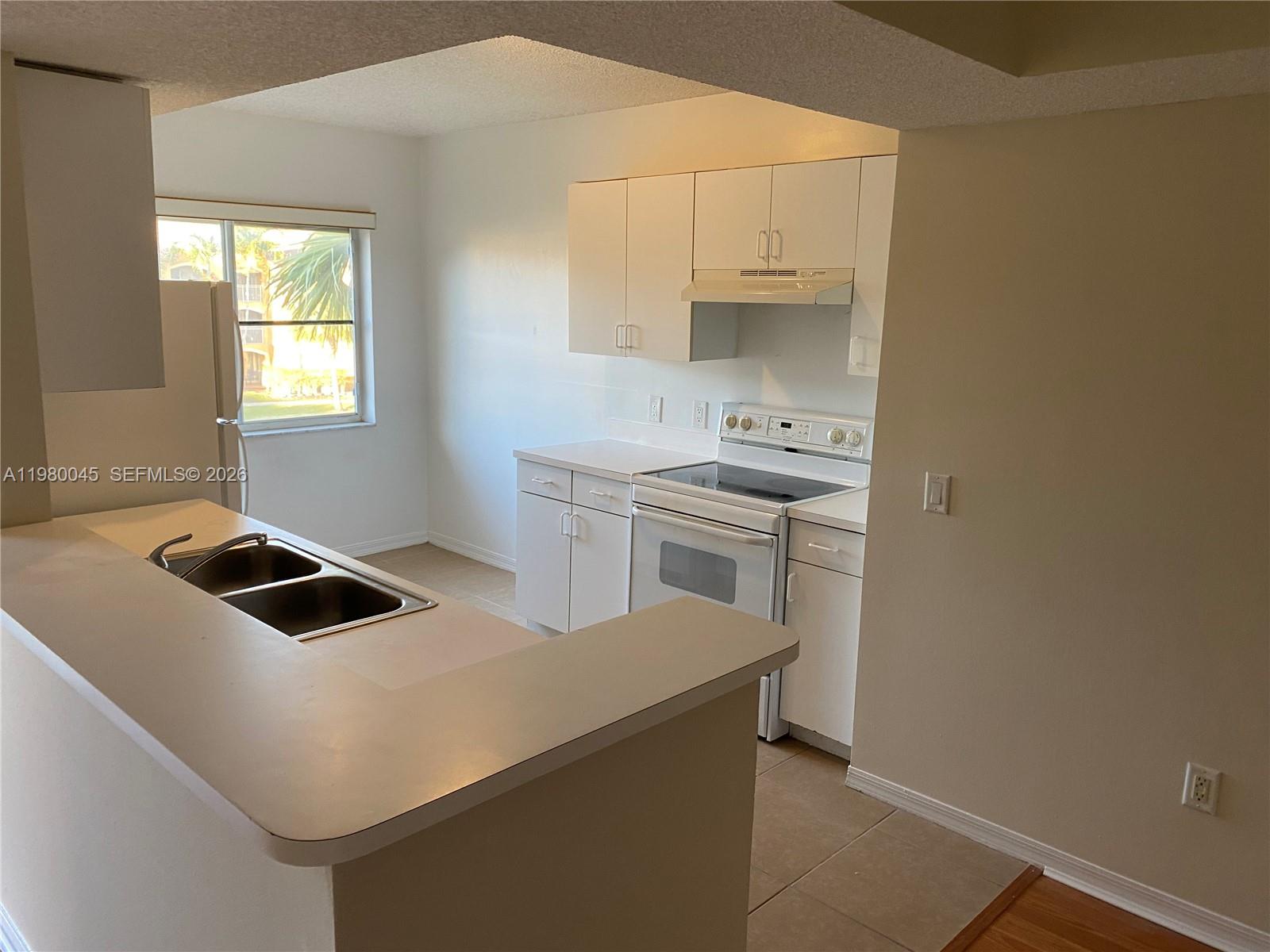 9645 NW 1ST CT # 302 Unit: 1-302