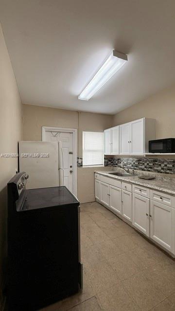 646 NW 14th Ter Unit: APT WEST
