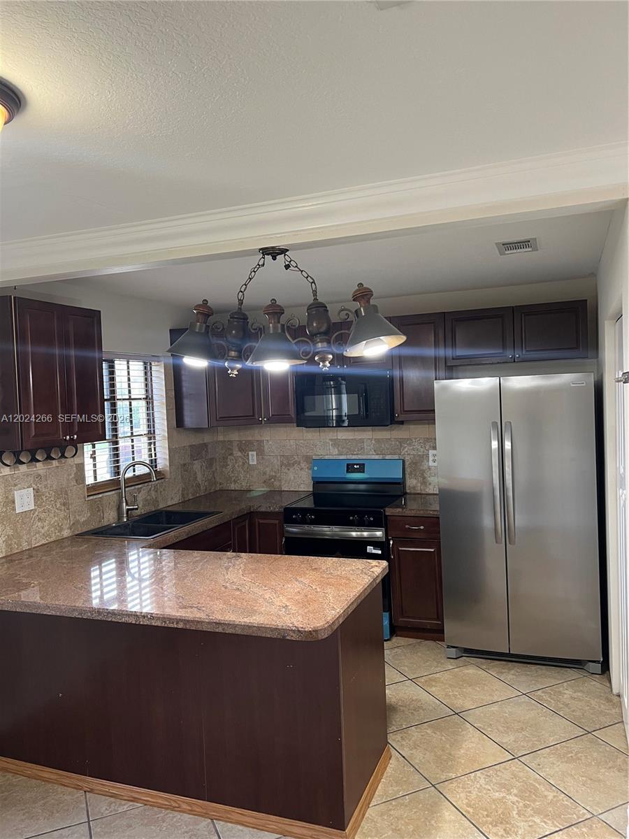 1126 NE 209th Ter