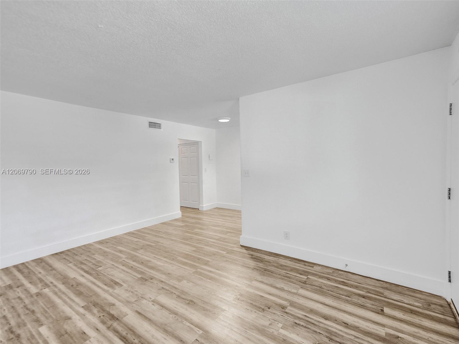 114 SE 8th St # 203