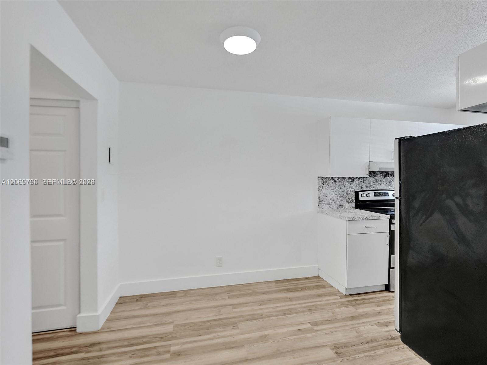 114 SE 8th St # 203