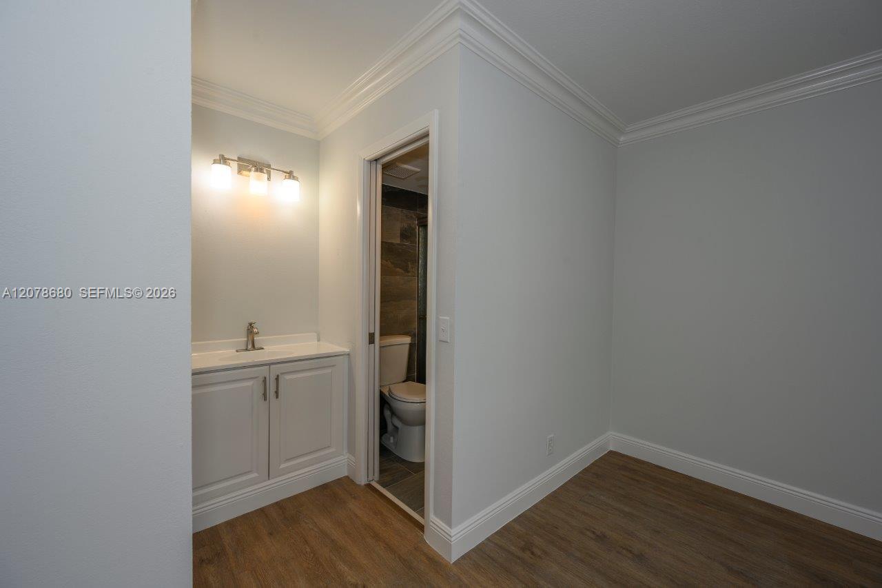 100 SE 7th St # 1