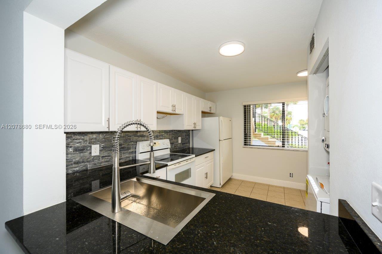 100 SE 7th St # 1