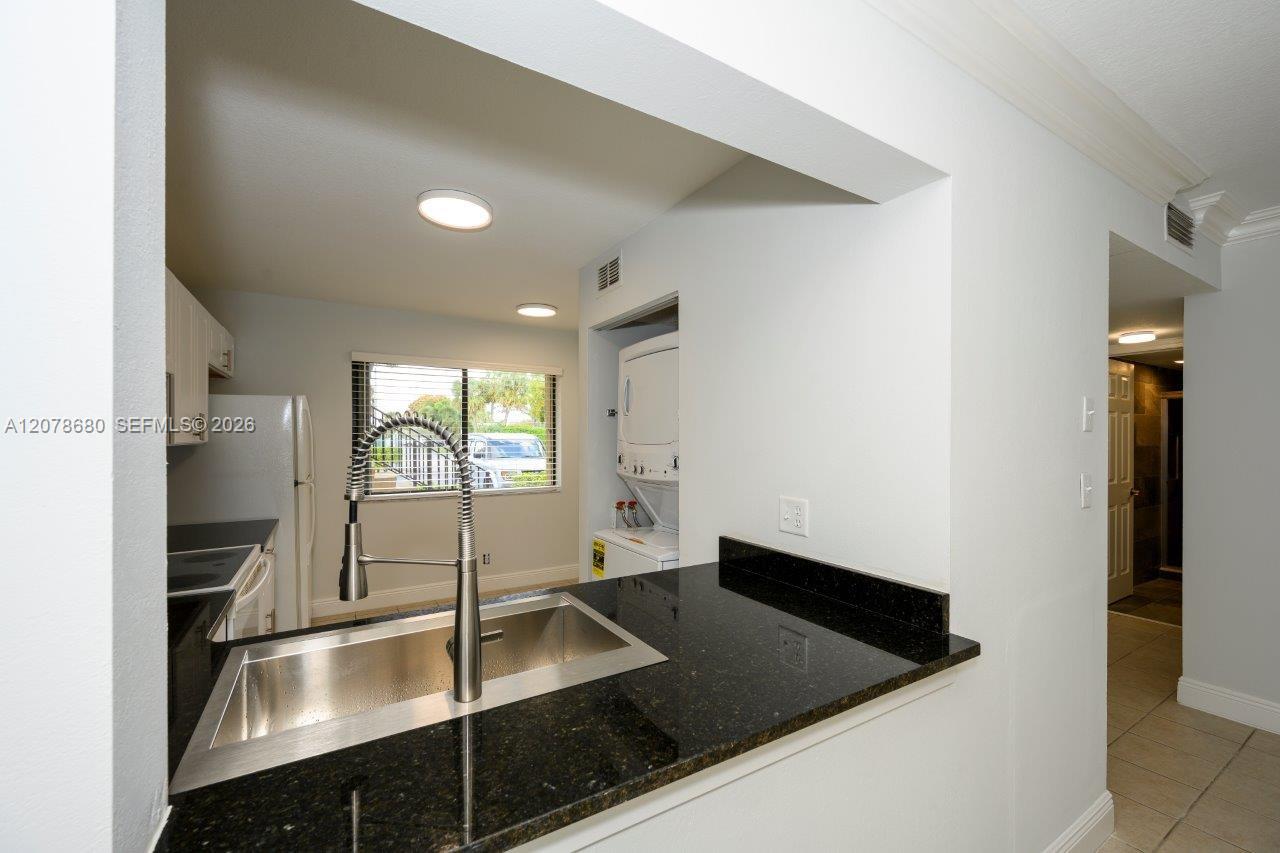 100 SE 7th St # 1
