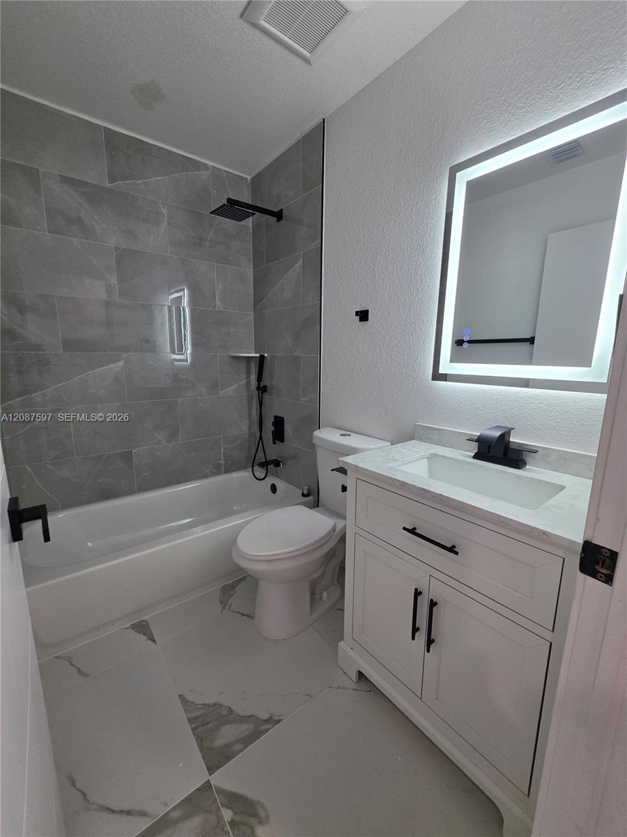 348 NW 8th St