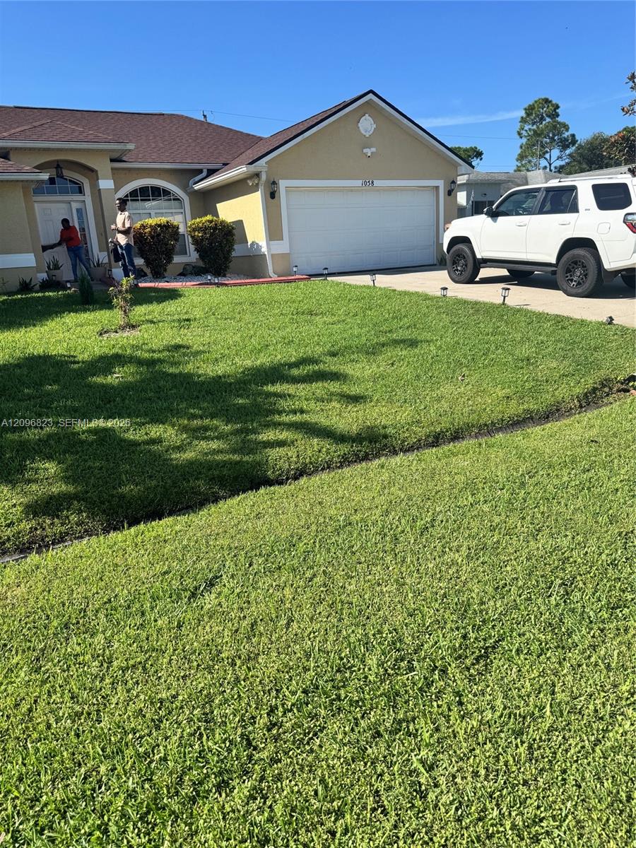 1058 SW Calmar Ave, Port St. Lucie
