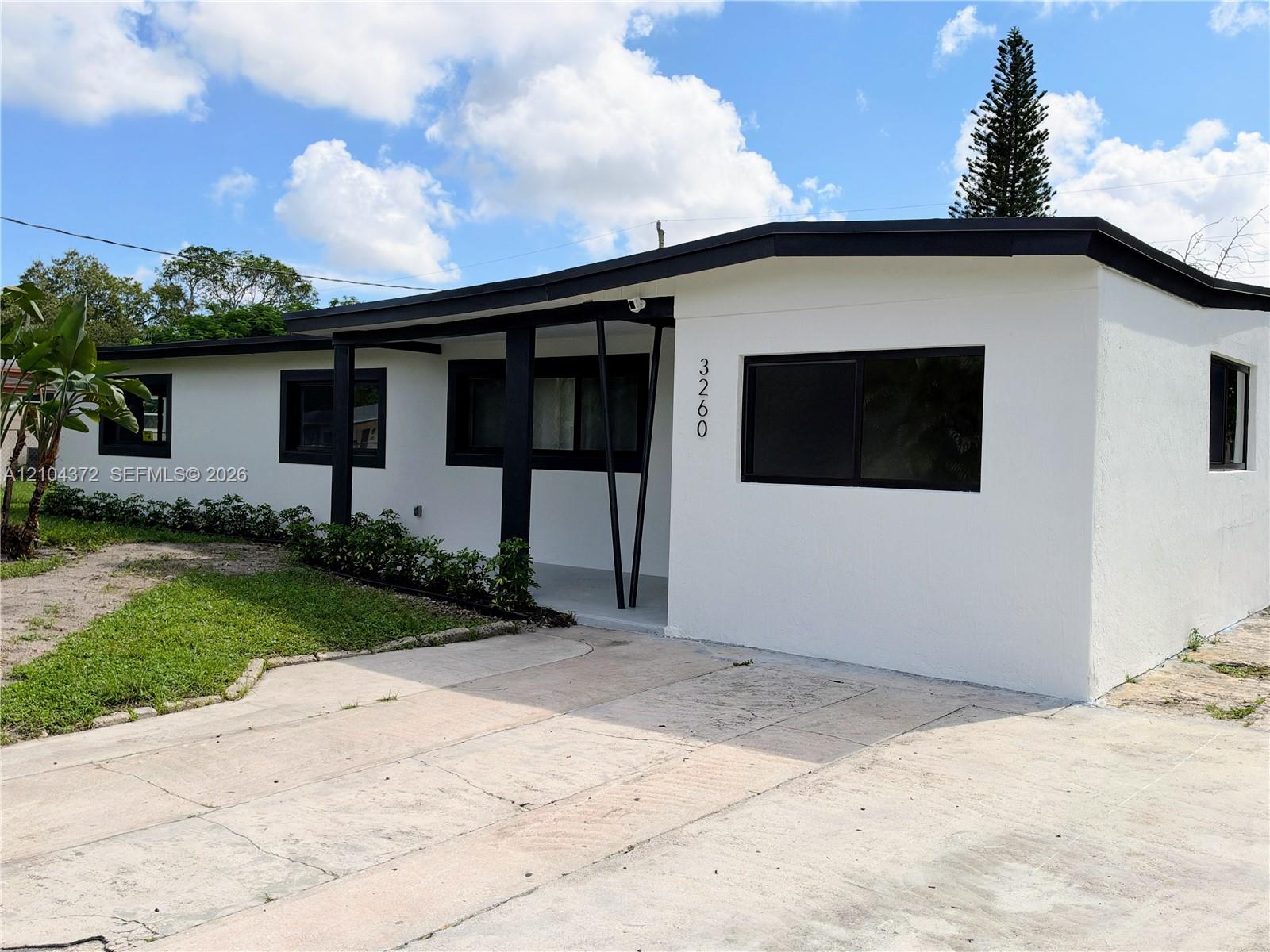 3260 NW 4th St