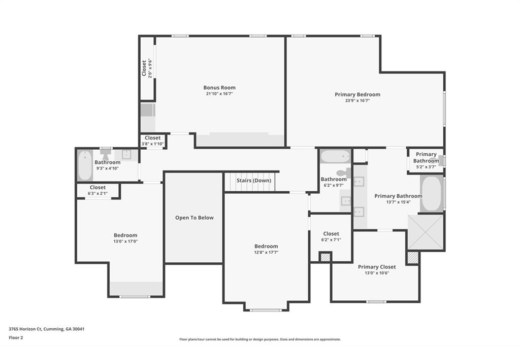 Second-floor plan with a bonus room, primary suite, two bedrooms, bathrooms, and an open-to-below area.