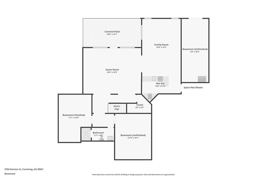 Basement floor plan with a game room, family room, wet bar, covered patio, and unfinished areas.
