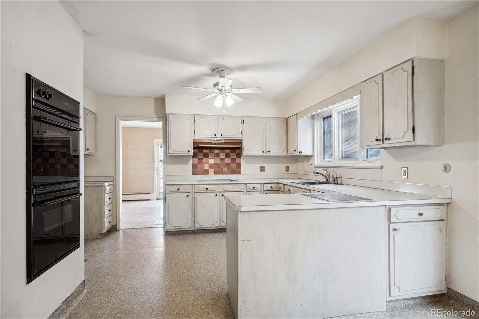 6955 E Exposition Avenue